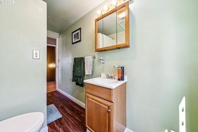 5246 SE 65th Ave, Portland, OR 97206 - bathroom featuring vanity and wood finished floors