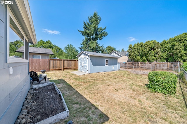 5246 SE 65th Ave, Portland, OR 97206 - fenced backyard featuring a vegetable garden and a storage shed