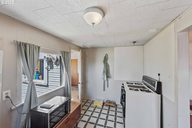 1387 Washington Ave, Coos Bay, OR 97420 - kitchen featuring gas range gas stove and tile patterned floors