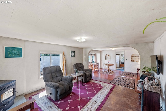 1387 Washington Ave, Coos Bay, OR 97420 - living area featuring arched walkways and wood finished floors