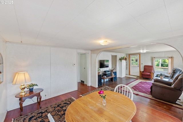 1387 Washington Ave, Coos Bay, OR 97420 - dining room with arched walkways and wood finished floors