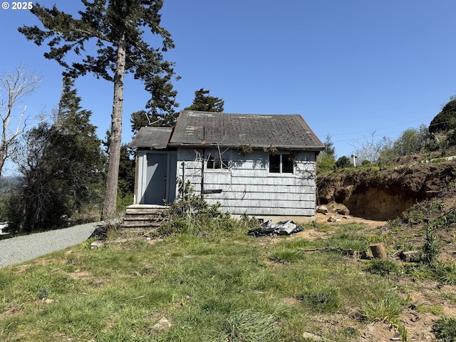 609 Vermont St, North Bend, OR 97459 - view of outbuilding with an outbuilding