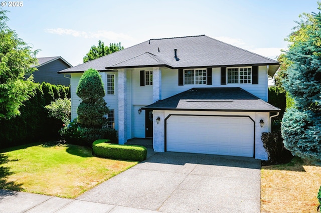 10014 NE 146th Ave, Vancouver, WA 98682 - traditional home featuring concrete driveway, a front yard, a garage, a shingled roof, and brick siding