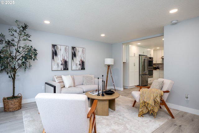 10014 NE 146th Ave, Vancouver, WA 98682 - living area featuring light wood-style flooring and recessed lighting
