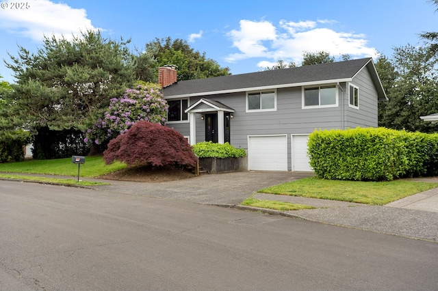 3707 NE 135th Ave, Portland, OR 97230 - raised ranch featuring driveway, a chimney, and a garage