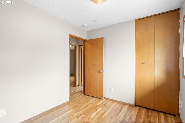 3707 NE 135th Ave, Portland, OR 97230 - unfurnished bedroom featuring light wood-style flooring, a closet, and baseboards