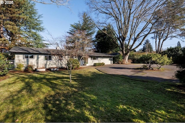 view of yard with a garage