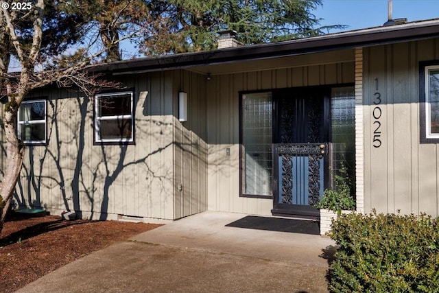 property entrance with a patio