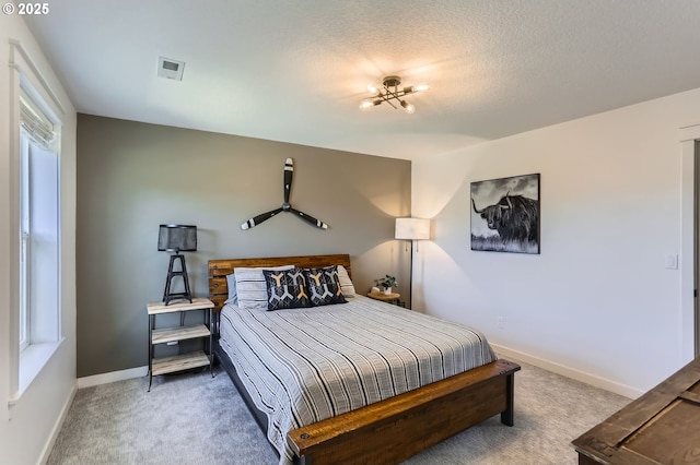 1028 E 16th St, Lafayette, OR 97127 - bedroom with light colored carpet, baseboards, and a textured ceiling