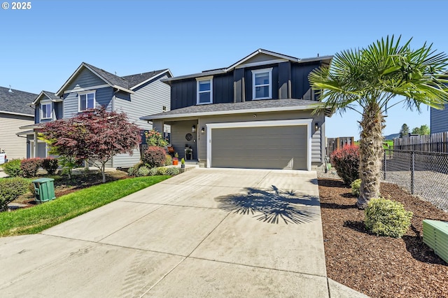 1028 E 16th St, Lafayette, OR 97127 - traditional-style house featuring driveway, fence, a garage, and board and batten siding