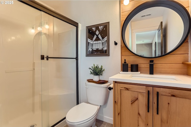 1028 E 16th St, Lafayette, OR 97127 - bathroom featuring a stall shower, toilet, vanity, and baseboards