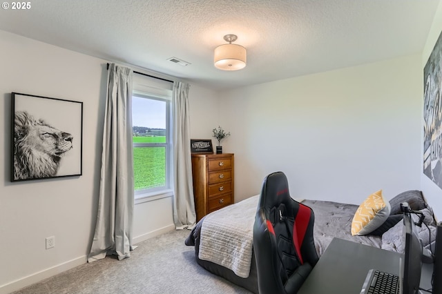 1028 E 16th St, Lafayette, OR 97127 - bedroom with carpet floors, baseboards, and a textured ceiling