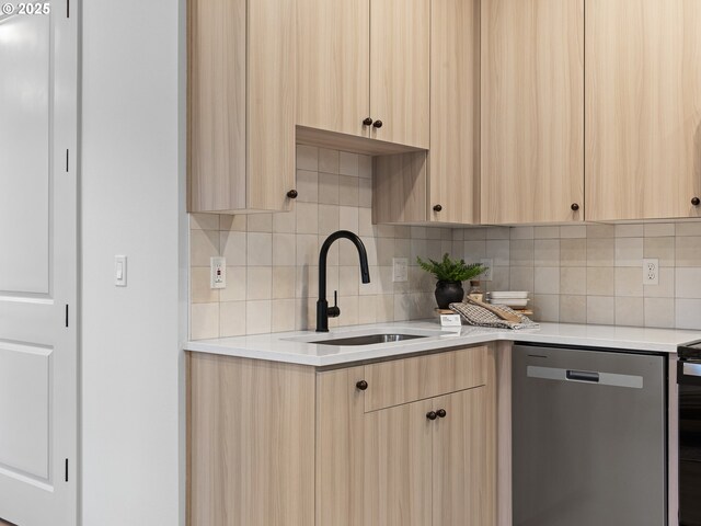 1616 SE Morrison St, Portland, OR 97214 - kitchen with stainless steel dishwasher, light brown cabinetry, modern cabinets, and a sink