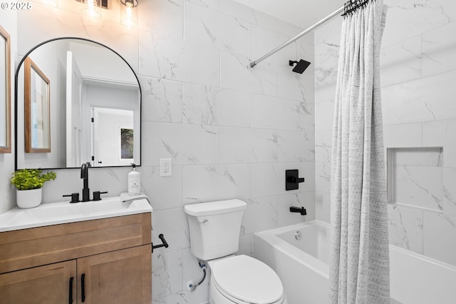 full bathroom featuring vanity, toilet, tile walls, and shower / tub combo