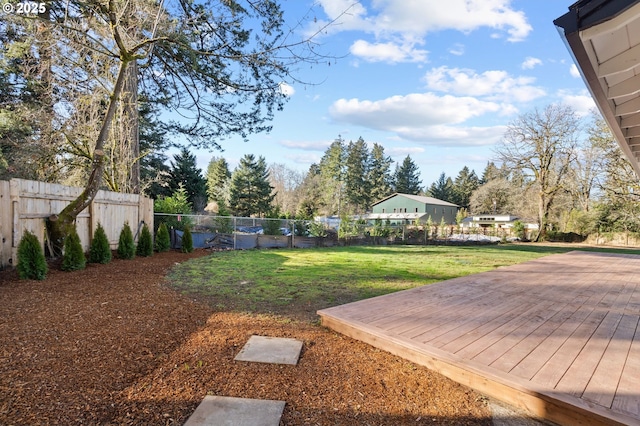 view of yard with a deck