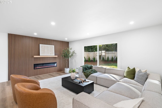 living room with light hardwood / wood-style floors