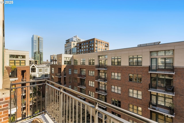 balcony featuring a city view