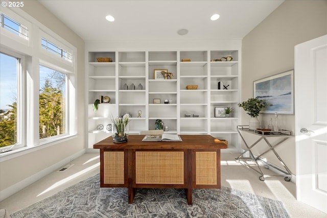 9037 NW Murdock St, Portland, OR 97229 - carpeted office featuring built in shelves, baseboards, and recessed lighting
