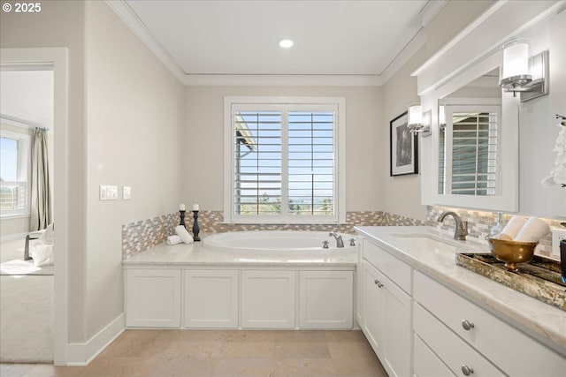 9037 NW Murdock St, Portland, OR 97229 - bathroom featuring crown molding, plenty of natural light, a garden tub, vanity, and backsplash