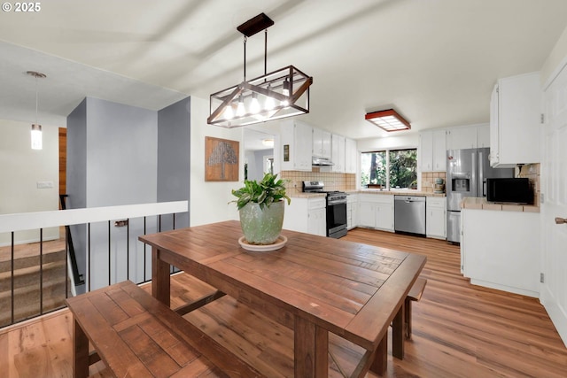 dining area featuring light hardwood / wood-style flooring