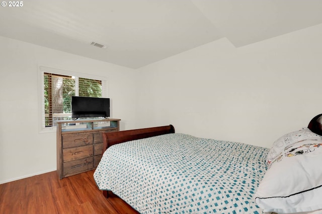 bedroom featuring hardwood / wood-style floors