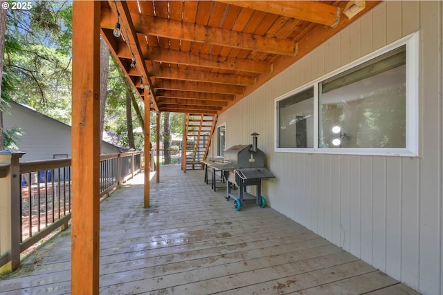 wooden terrace with area for grilling