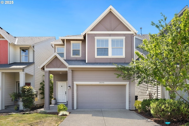 18646 SW Hideo Ct, Beaverton, OR 97003 - view of property featuring a garage, concrete driveway, stucco siding, and roof with shingles