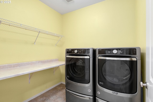 18646 SW Hideo Ct, Beaverton, OR 97003 - washroom with washer and clothes dryer and baseboards