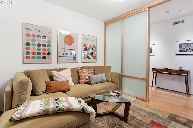 living room with hardwood / wood-style flooring