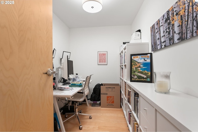 home office featuring light hardwood / wood-style floors