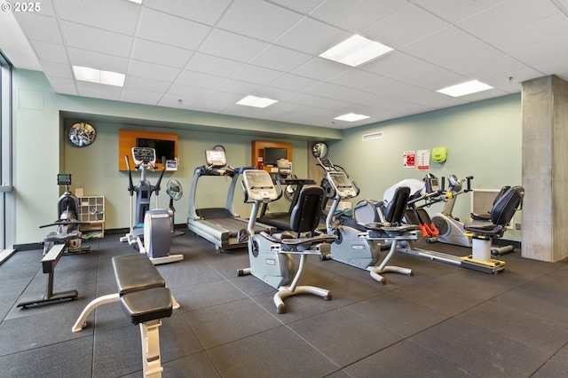 gym featuring a drop ceiling