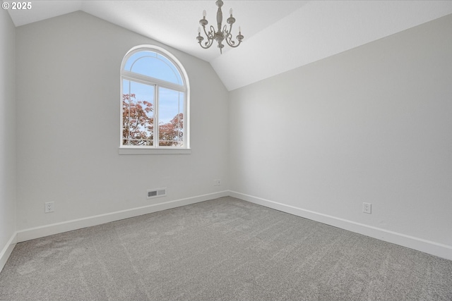 9240 SW Stono Dr, Tualatin, OR 97062 - carpeted empty room featuring lofted ceiling and a chandelier