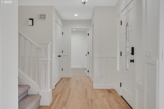 9240 SW Stono Dr, Tualatin, OR 97062 - corridor featuring stairs, light wood-type flooring, and recessed lighting