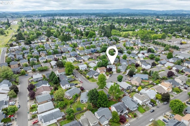 aerial overview of property's location with nearby suburban area