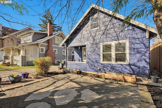 view of front of property featuring a chimney