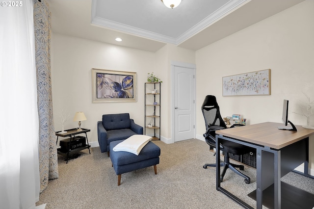 office area with crown molding, a raised ceiling, and carpet floors