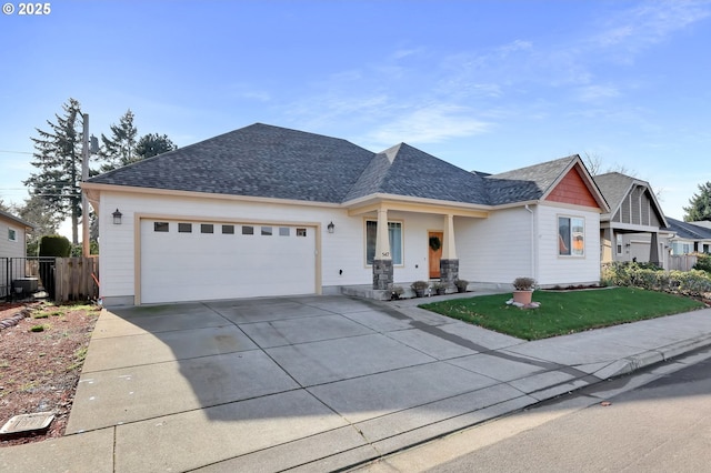 view of front of house with a garage and covered porch