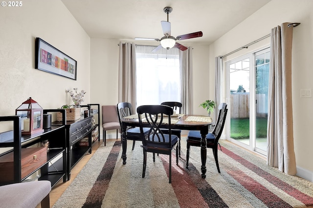 dining room featuring ceiling fan