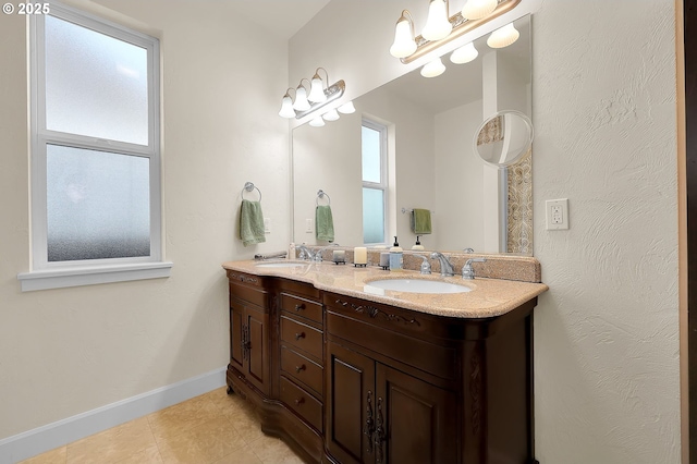 bathroom with vanity and tile patterned floors