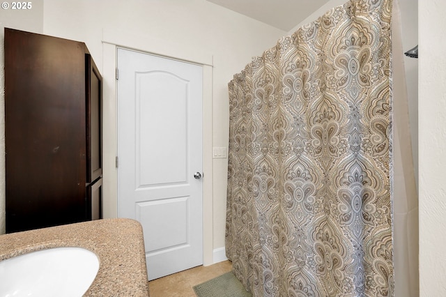 bathroom featuring sink and tile patterned floors