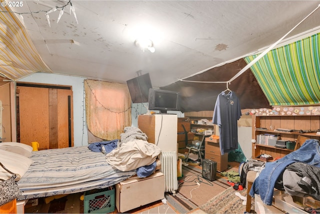 bedroom featuring lofted ceiling