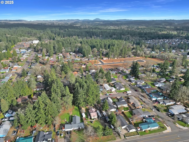 drone / aerial view with a forest view