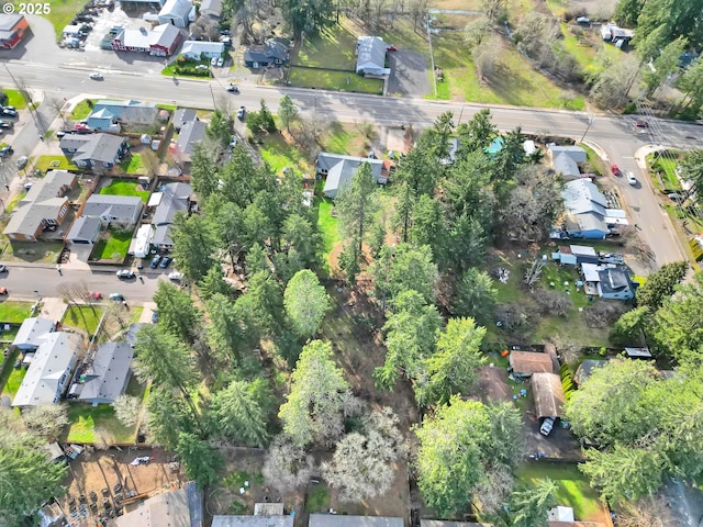 birds eye view of property with a residential view