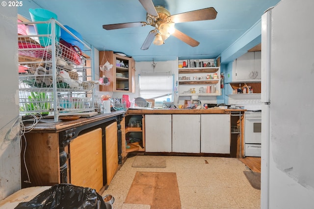 kitchen with ceiling fan, light floors, open shelves, and white cabinetry