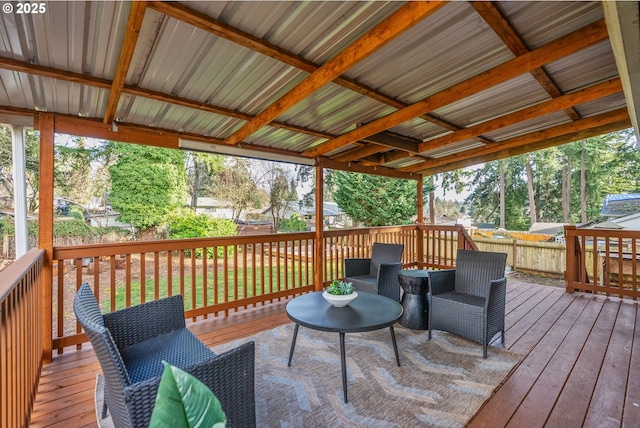 deck with a fenced backyard