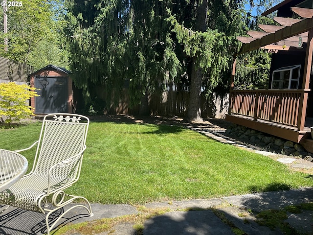3241 SW Spring Garden St, Portland, OR 97219 - view of grassy yard with a storage unit