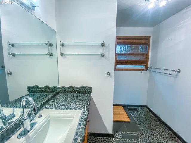 3241 SW Spring Garden St, Portland, OR 97219 - bathroom featuring baseboards and vanity