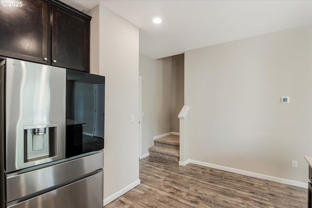 7119 NE 152nd Pl, Vancouver, WA 98682 - kitchen featuring stainless steel fridge with ice dispenser, dark brown cabinetry, light wood-style flooring, baseboards, and recessed lighting