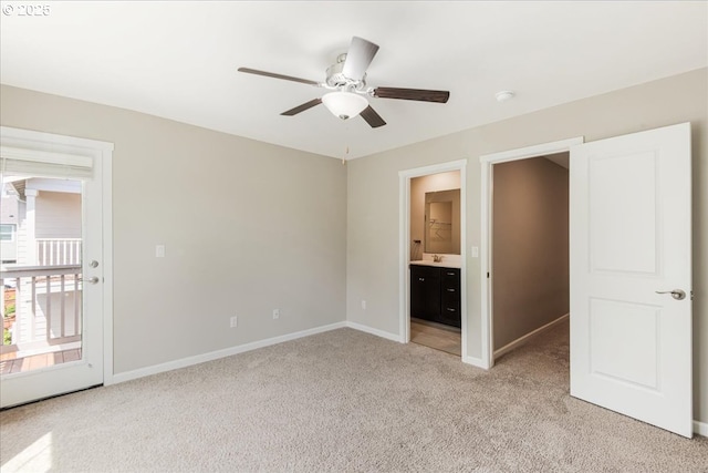 7119 NE 152nd Pl, Vancouver, WA 98682 - unfurnished bedroom featuring light carpet, baseboards, a sink, ceiling fan, and ensuite bath