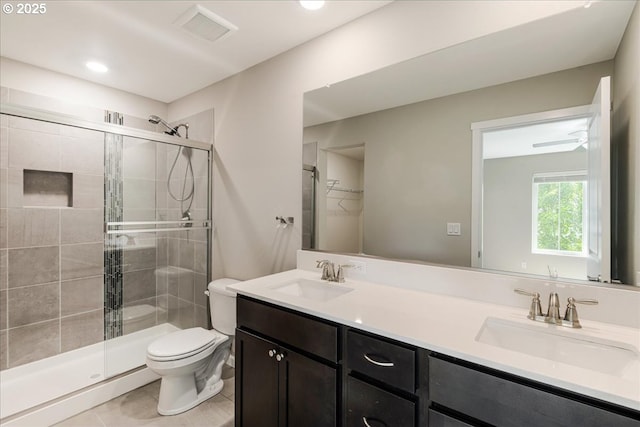 7119 NE 152nd Pl, Vancouver, WA 98682 - bathroom with toilet, a shower stall, double vanity, and tile patterned floors